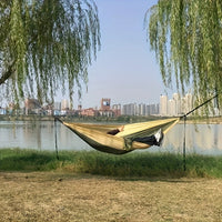 Portable outdoor camping hammock, suitable for backpacking, beach, backyard, garden, hiking, all seasons.