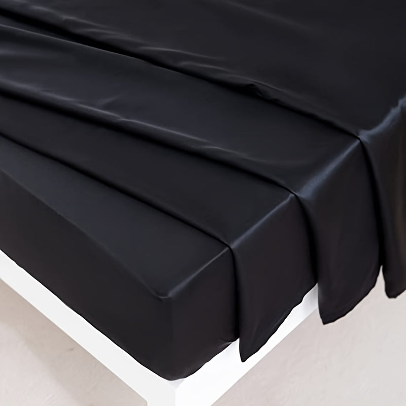 This 4pcs Satin Bed Sheet Set Includes One Fitted Sheet, One Flat Sheet, And Two Pillowcases Without Inserts. The Solid Color Showcases a Simple And Elegant Design That Never Goes Out of Style. Made from Polyester, The Fabric